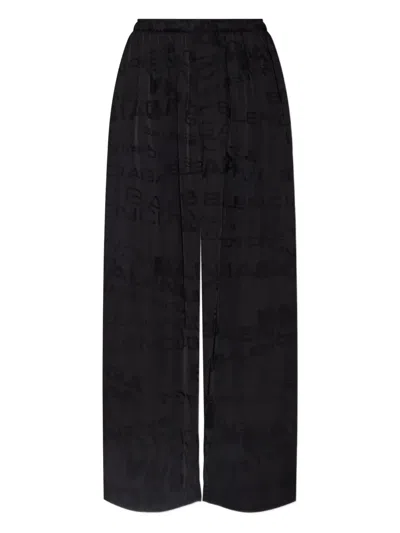 Balenciaga Logo Flared Trousers In Black