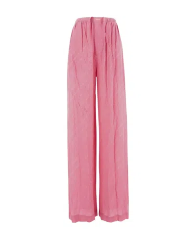 BALENCIAGA BALENCIAGA ALL-OVER LOGO PRINTED PYJAMA PANTS
