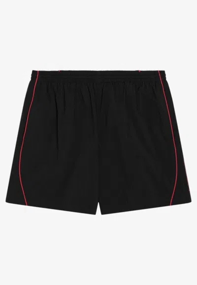 BALENCIAGA LOGO LETTERING TRACK SHORTS