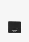 Balenciaga Men Black Bi-fold Wallet With Logo Lettering On The Front In Grained Leather Man In Black