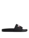 Balenciaga Embossed Logo Slip-on Sandals With Moulded Footbed In Black