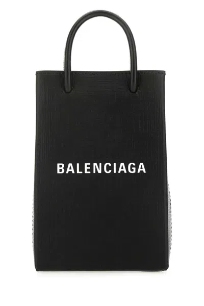 Balenciaga Logo-embossed Calf Leather Phone Case Clutch In Black