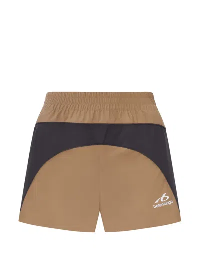 Balenciaga Logo-print Panelled Running Shorts In Brown