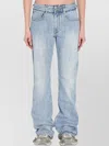 Balenciaga Low-rise Raw-cut Waistband Denim Trousers In Blue