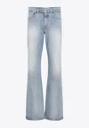 Balenciaga Logo Patch Distressed Jeans In Blue
