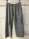 Balenciaga Luxury Script Loose Track Pants In Gray