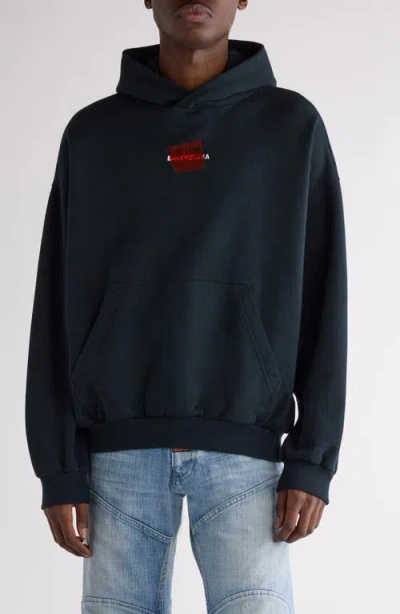 Balenciaga Medium Fit Taped Logo Graphic Hoodie In Washed Black