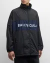 Balenciaga Oversized Logo-print Colour-block Shell Jacket In 1000 Black