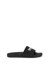 Balenciaga Embossed Logo Slip-on Sandals With Moulded Footbed In Black