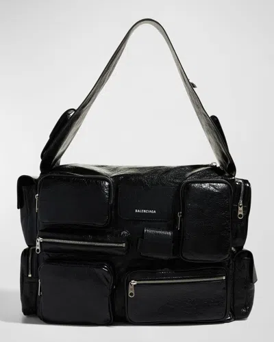 BALENCIAGA MEN'S SUPERBUSY LEATHER MULTI-POCKET SLING BAG, LARGE