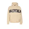 Balenciaga Ripped Pocket Tape Type Hoodie In Yellow