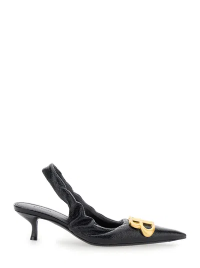 BALENCIAGA BALENCIAGA WOMEN 'MONACO' BLACK SLINGBACK PUMPS WITH LOGO PLAQUE ON THE FRONT AND LOW STILETTO HEEL 