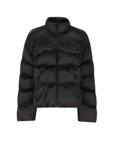 BALENCIAGA NYLON DOWN JACKET WITH ALL-OVER LETTERING LOGO