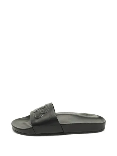 Pre-owned Balenciaga Piscine Bb Slides In Black