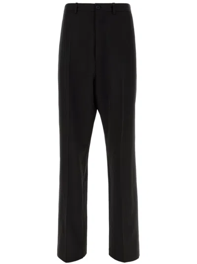 BALENCIAGA PRESSED CREASE TUXEDO TROUSERS