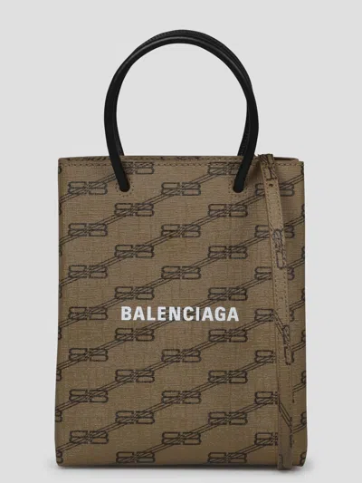 Balenciaga Printed Canvas Phone Case In Brown
