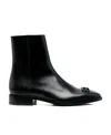 Balenciaga Glossy Ankle Boots With Pointed Toe And Logo Embellishment In Black