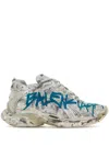 Balenciaga Distressed White Sneakers With Bold Graphic Print In White