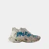 Balenciaga Distressed White Sneakers With Bold Graphic Print In White