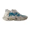 Balenciaga Distressed White Sneakers With Bold Graphic Print