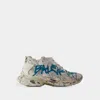 Balenciaga Distressed White Sneakers With Bold Graphic Print In White