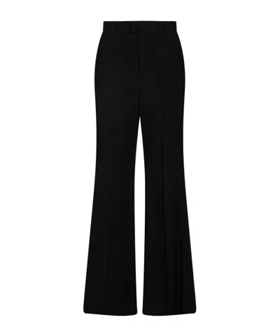 Balenciaga Solid-colored Flared Trousers In Black