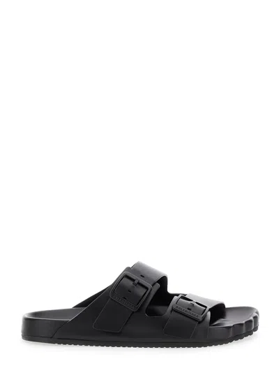 BALENCIAGA BALENCIAGA 'SUNDAY' BLACK SANDALS WITH ENGRAVED LOGO IN LEATHER WOMAN