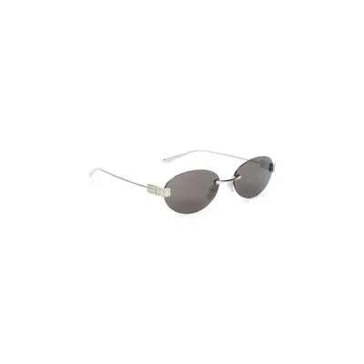 Balenciaga Silver Black Oval Sunglasses. In Metallic