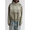 Balenciaga Tape Type Ripped Pocket Large Fit Fleece Hoodie In Brown