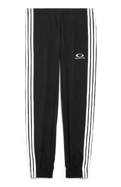 BALENCIAGA BALENCIAGA TAPERED BLACK TROUSERS WITH WHITE STRIPES