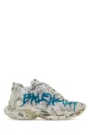 Balenciaga Distressed White Sneakers With Bold Graphic Print