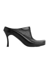 Balenciaga Debossed Logo Heeled Mules In Black