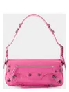 Balenciaga Le Cagole Sling Small Varnished Leather Shoulder Bag In Pink