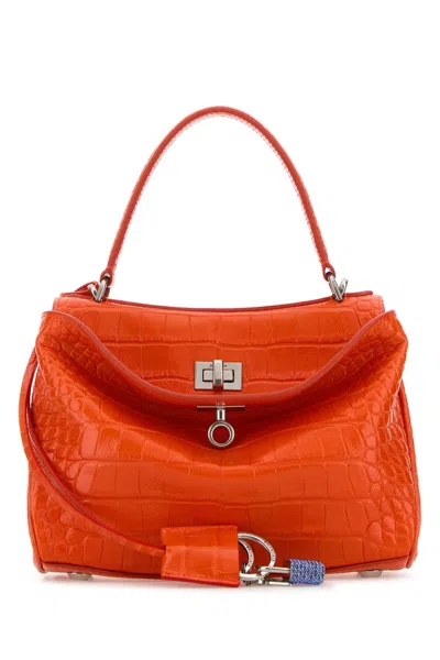 BALENCIAGA BALENCIAGA WOMEN ORANGE LEATHER MINI RODEO HANDBAG