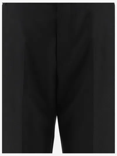 Balenciaga Wool-blend Pleated Trousers In Black