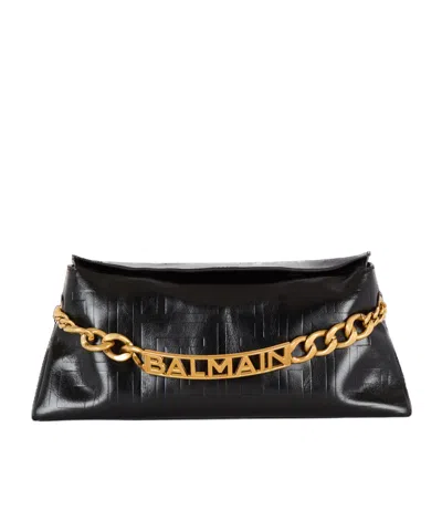 Balmain 1945 Soft Clutch In Monogrammed Calfskin In Black