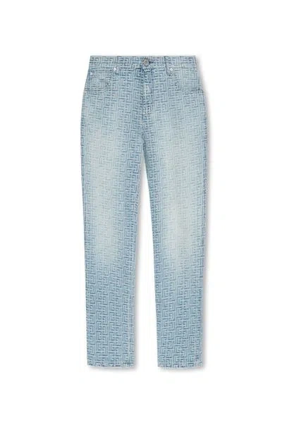 Balmain All-over Monogram Printed Cotton Jeans For Men In Blue