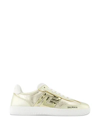 Balmain Swan Low Top Leather Sneakers Gold In Neutral