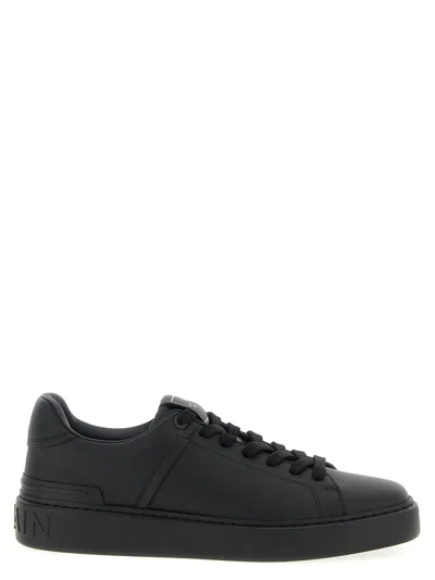 Balmain Logo-embossed Leather Sneakers In Black