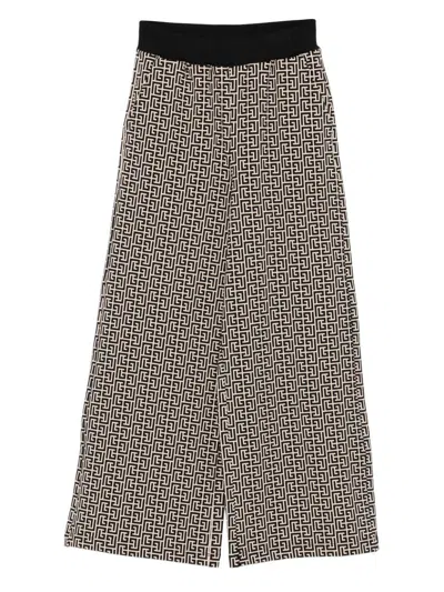BALMAIN Beige and black monogram trousers BALMAIN