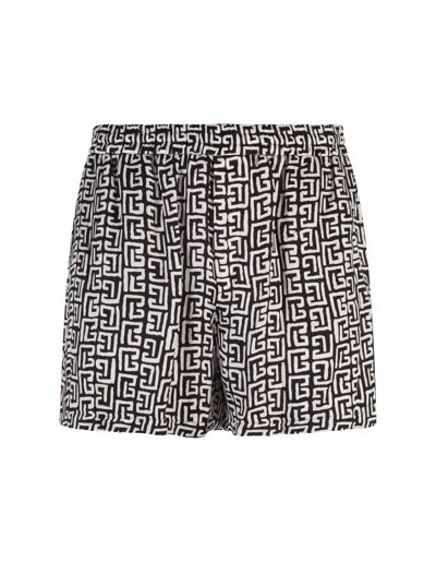 BALMAIN BLACK SHORTS WITH MONOGRAM MOTIF
