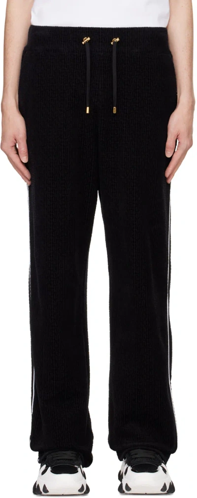 Balmain Black Velvet Monogram Kiss Jersey Sweatpants In 0pa Noir
