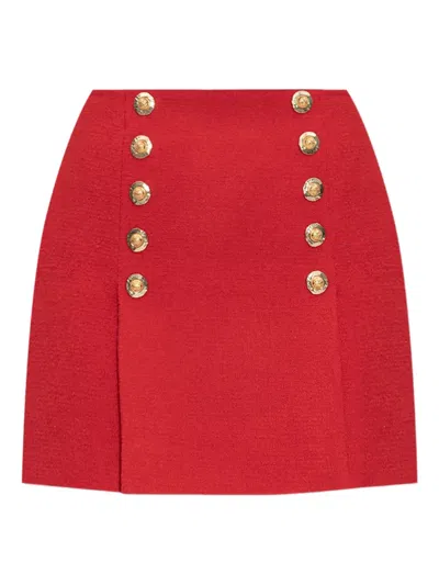 BALMAIN BUTTON-DETAIL VIRGIN WOOL MINI SKIRT