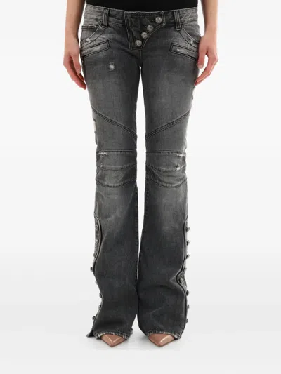 BALMAIN BUTTON-EMBELLISHED DISTRESSED JEANS