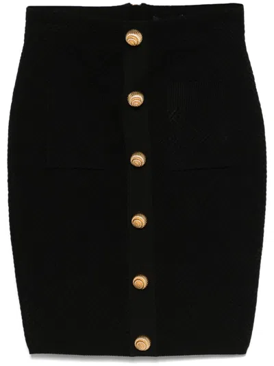 Balmain "checkered" Knit Skirt Featuring Front Pockets In Black