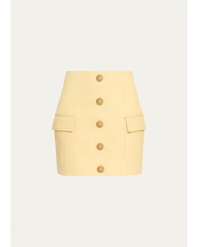 Balmain Button-front Leather Mini Skirt In Jaune Pale