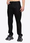 Balmain Coated Straight-leg Jeans In Black