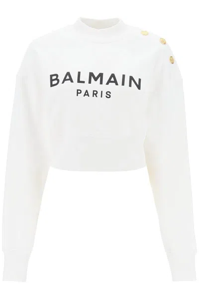 BALMAIN CROPPED SWEATSHIRT WITH LOGO PRINT AND BUTTONS