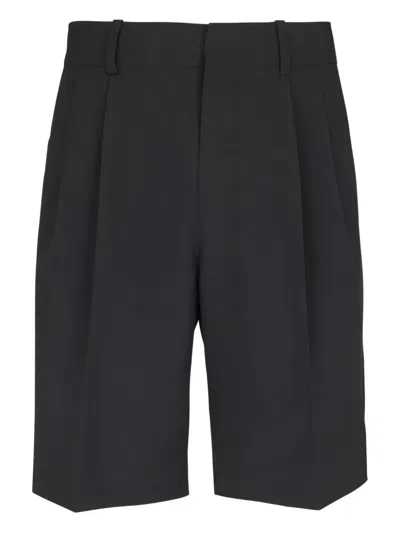 Balmain Darted Wool Shorts In Black