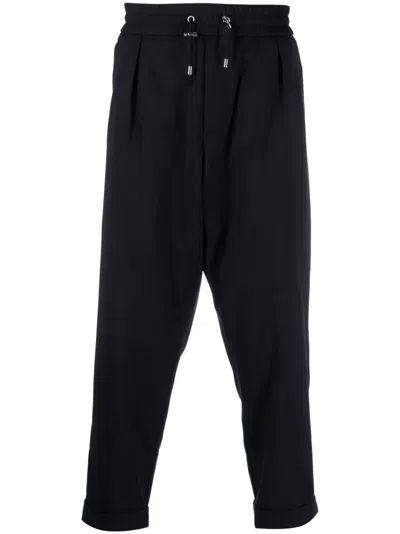 Balmain Timeless Embossed-button Drawstring-waist Trousers. In Black